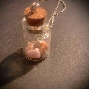 Itty bitty Hawaiian sea shell tiny glass bottle / necklace.